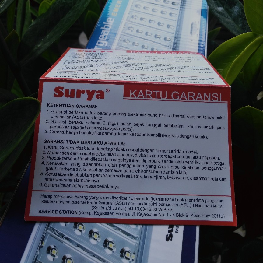 Kartu garansi elektronik senter lampu darurat cap Surya 