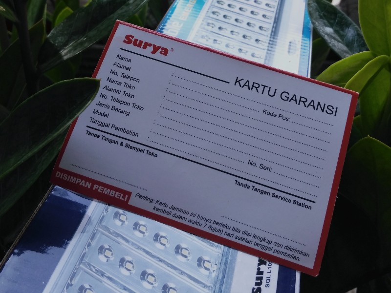 Kartu garansi elektronik senter lampu darurat cap Surya