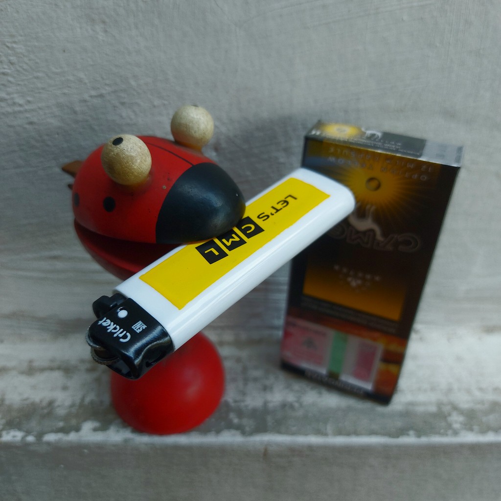 Korek gas seharga Rp 500 sebagai promo rokok Camel Option Capsule 