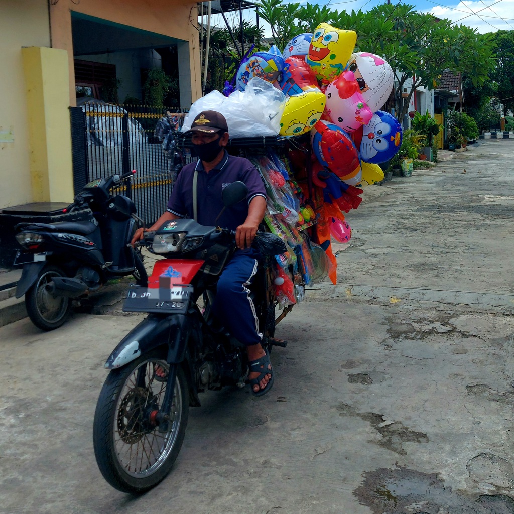Motor pedagang balon pres 