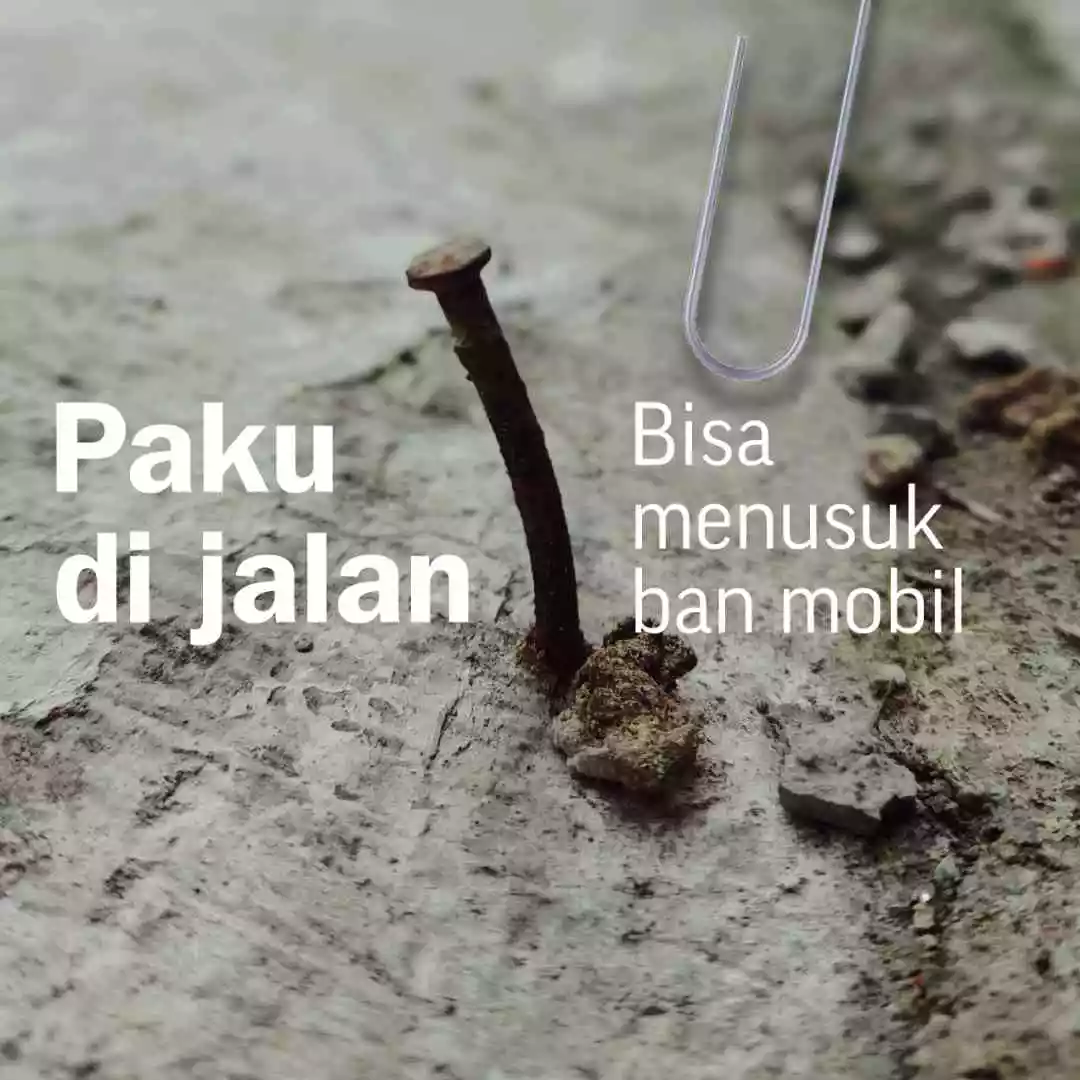 Paku tertancap di jalan beton, bisa menusuk ban mobil